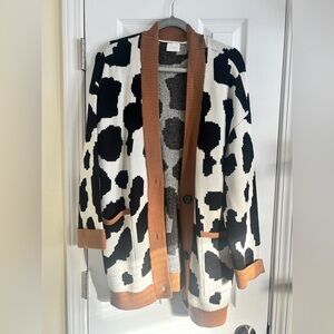 Cyrus Black and White Knit with Brown Collar